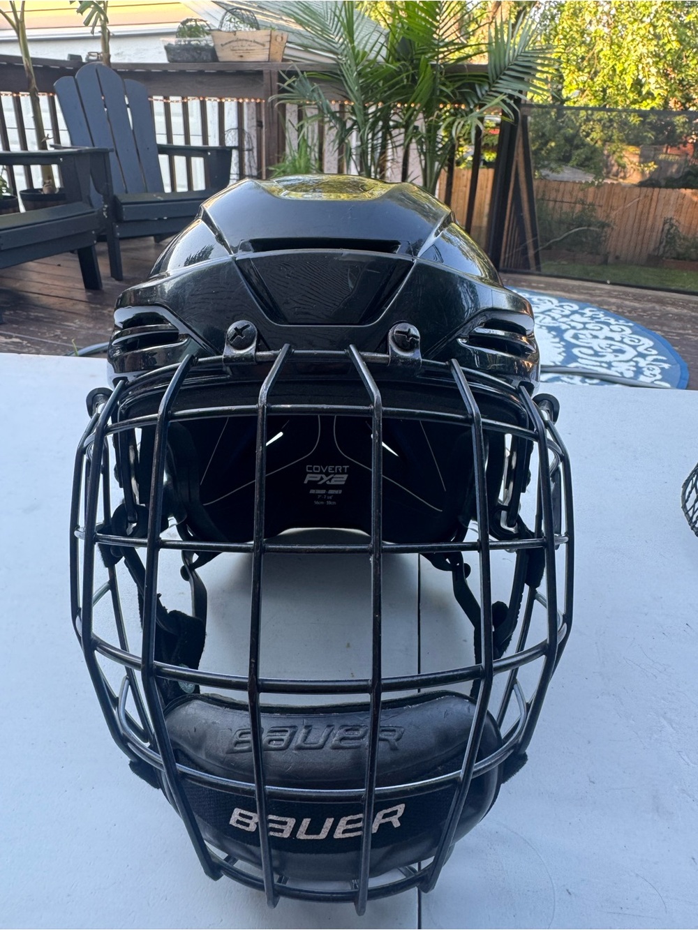 Warrior Black Hockey Helmet with Full Face Cage